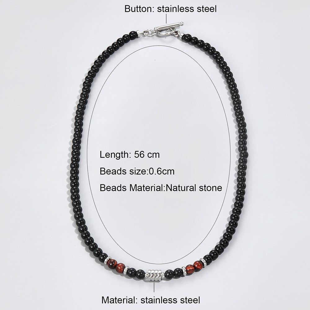 A stainless steel necklace of beads combined with the eye of the tiger