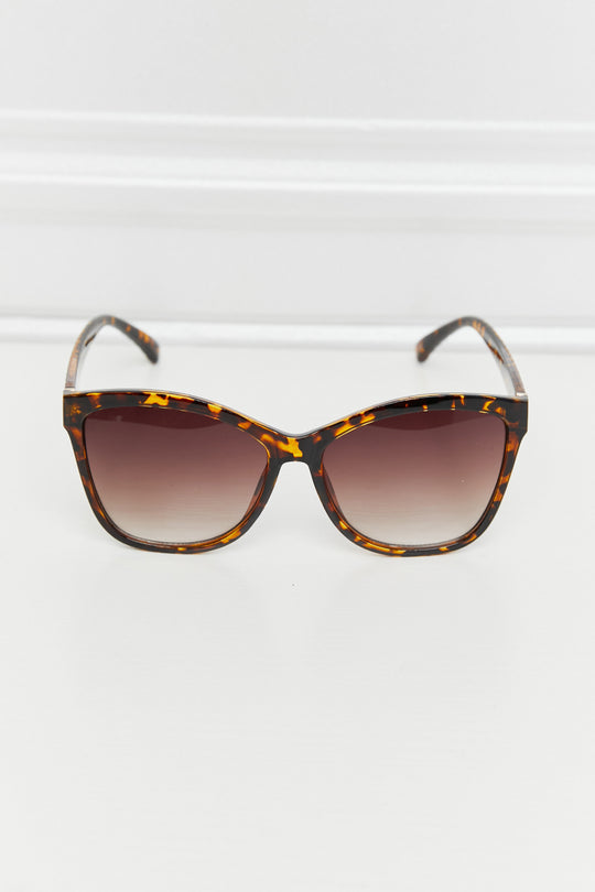 Full Rim UV400 Polycarbonate Sunglasses In a mottled chestnut color